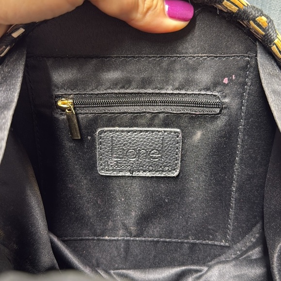 Lionel Chevron Patterned round Crossbody Bag - Picture 8 of 8